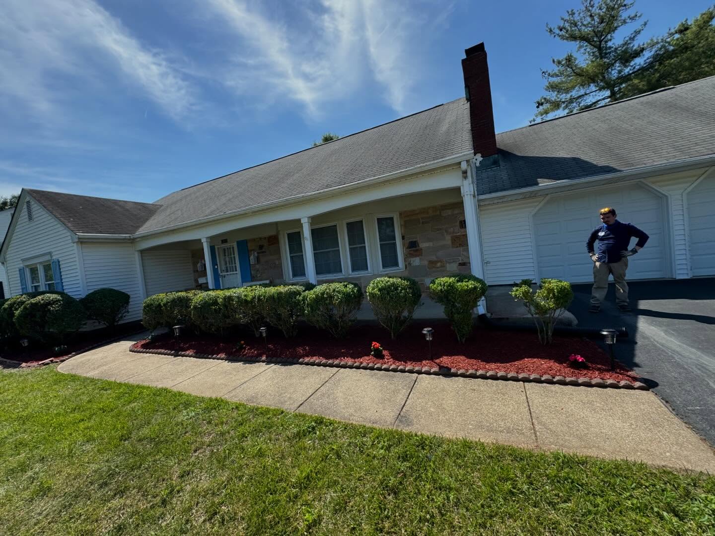 Freshly manicured estate garden with stone pathway